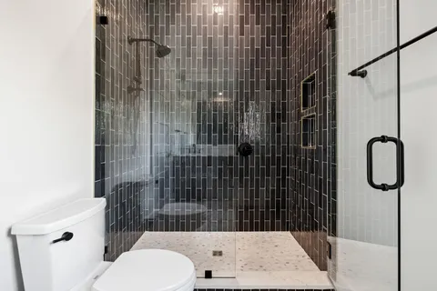 a view of an empty room with windows