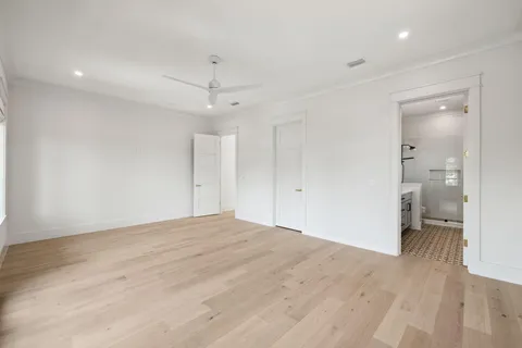 a view of balcony with wooden floor