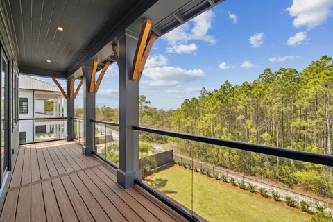 a bathroom with a double vanity sink toilet and shower