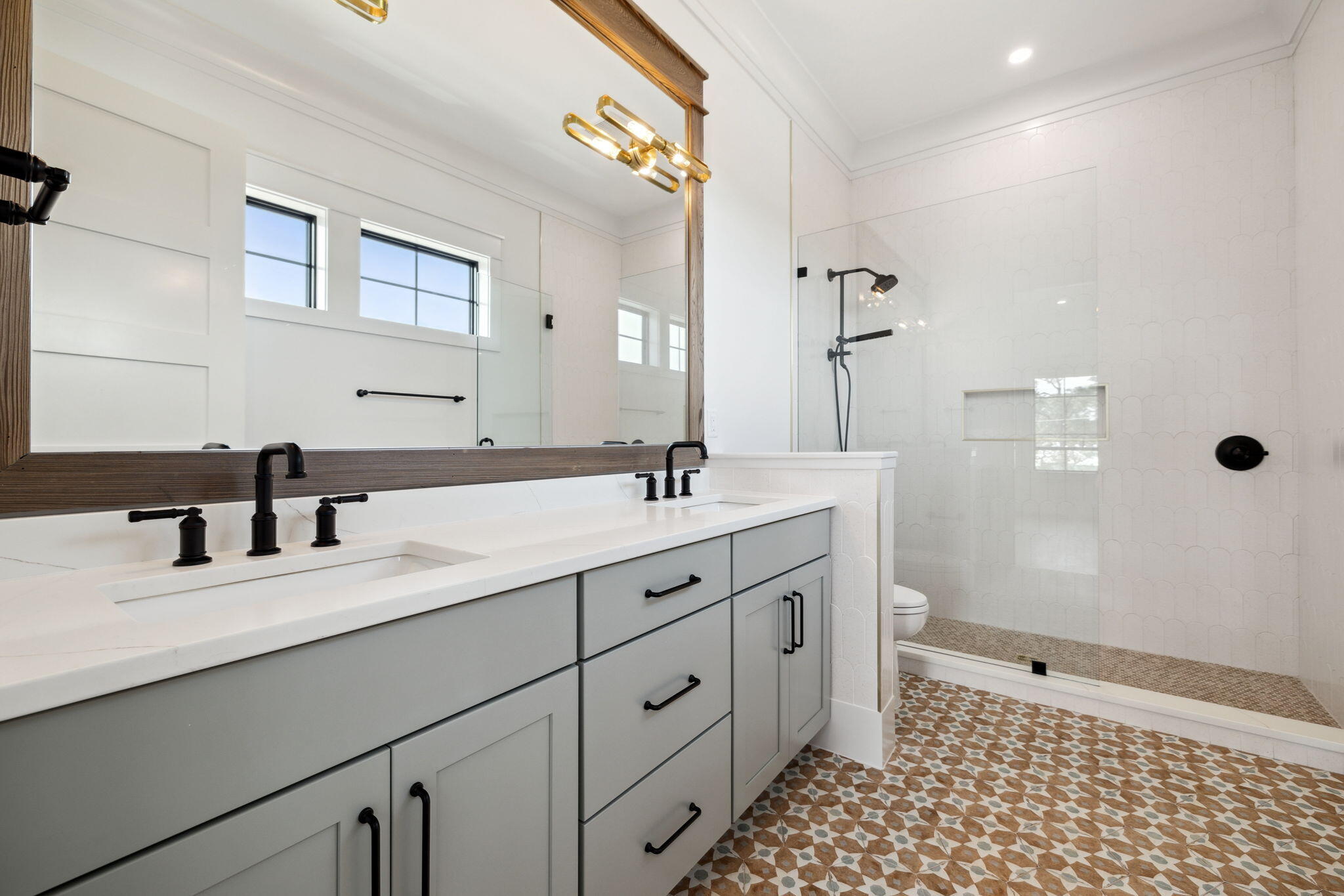 20 Loon Lake Drive Santa Rosa Beach, FL 32459 - Photo 41 of 54 a bathroom with a double vanity sink toilet and shower