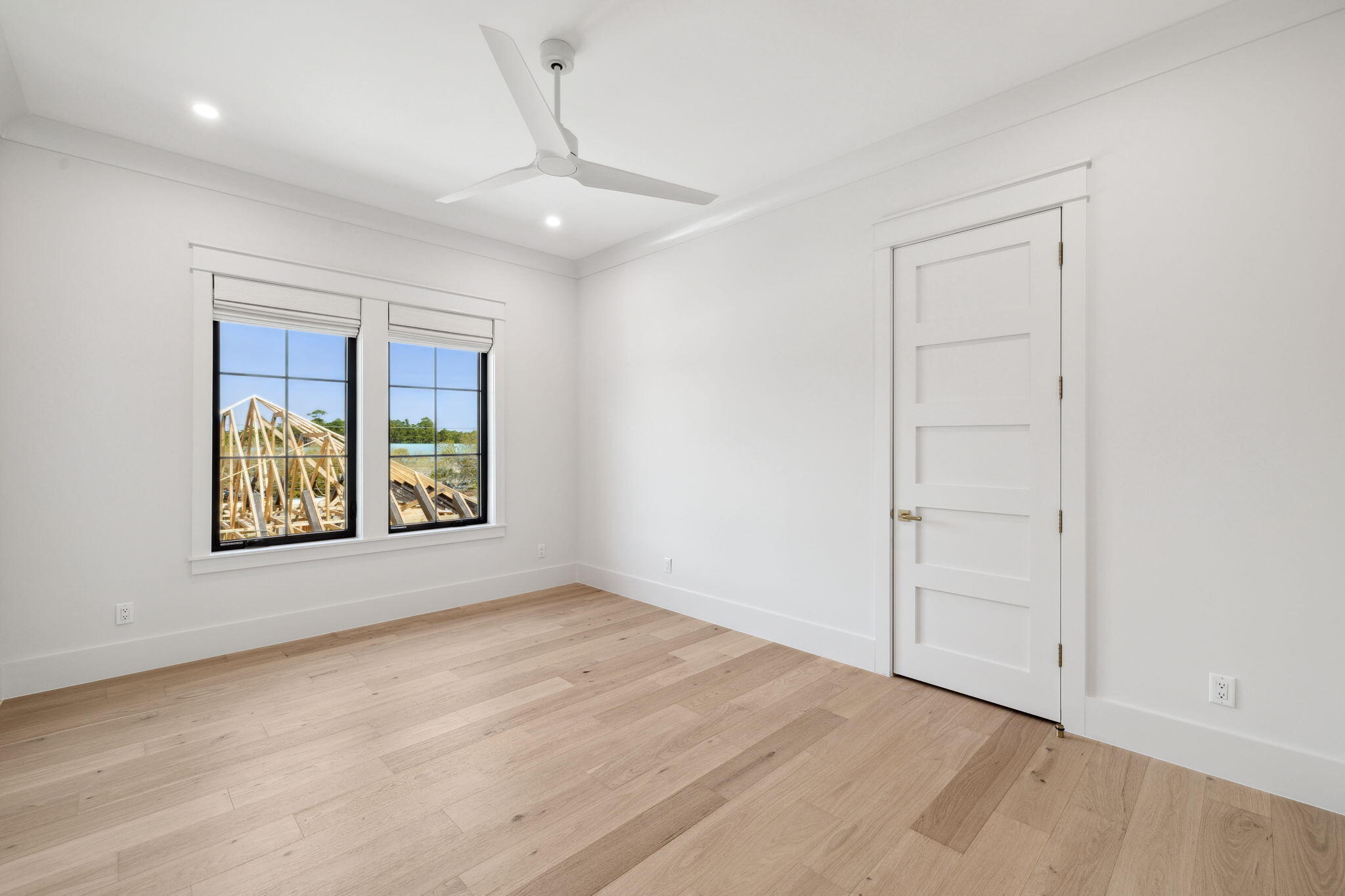 20 Loon Lake Drive Santa Rosa Beach, FL 32459 - Photo 42 of 54 wooden floor in an empty room with a window