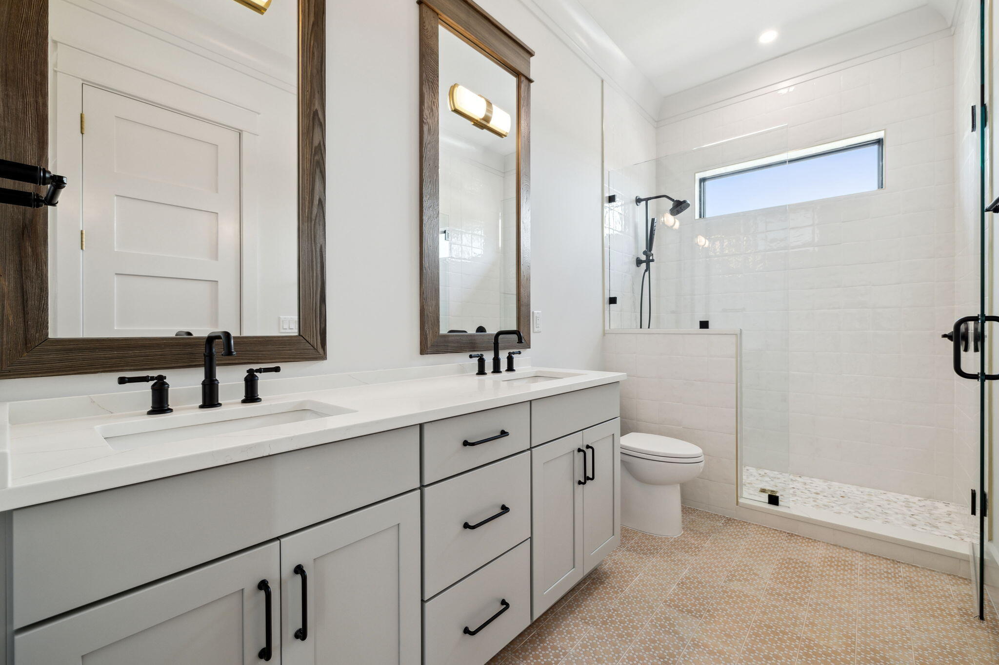 20 Loon Lake Drive Santa Rosa Beach, FL 32459 - Photo 43 of 54 a bathroom with a double vanity sink toilet and shower