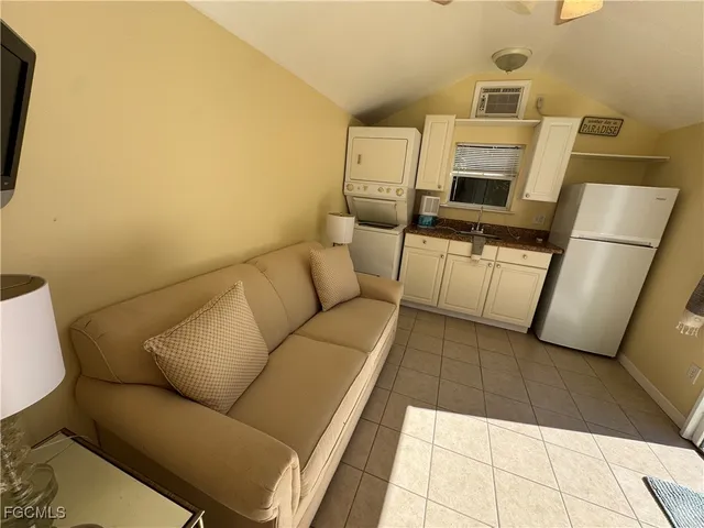 a living room with a couch and a flat screen tv