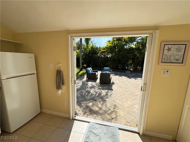 a view of a living room with a large window