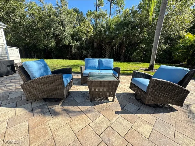 a view of outdoor space yard swimming pool and furniture
