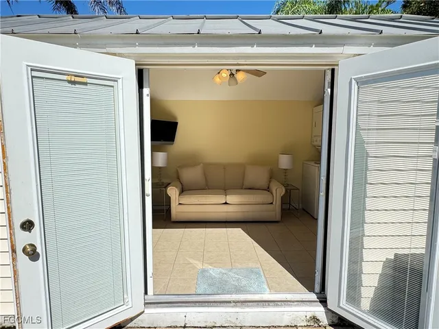 a living room with a couch and a table
