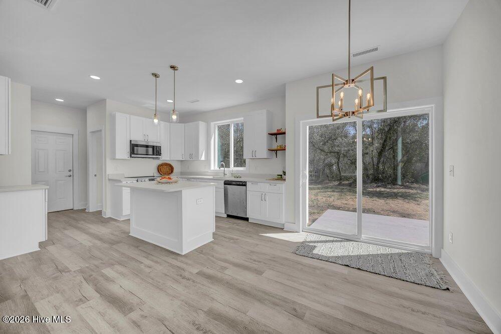 288 Charlestown Road Southport, NC 28461 - Photo 9 of 29 Dining Room/ Kitchen