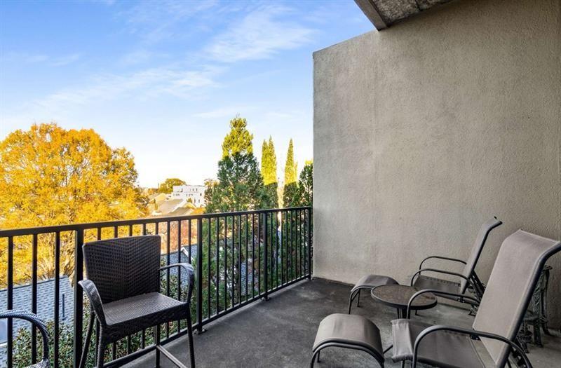 384 Ralph McGill Boulevard Northeast, Unit 313 Atlanta, GA 30312 - Photo 24 of 31 a view of a chairs in balcony