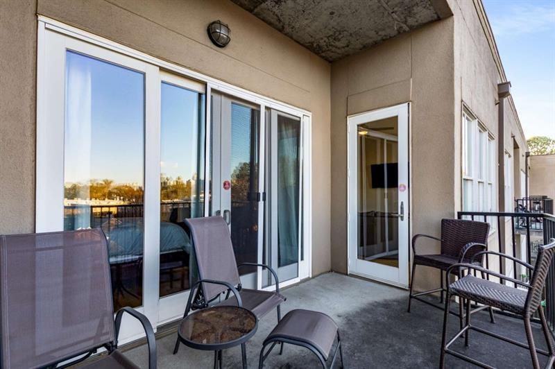 384 Ralph McGill Boulevard Northeast, Unit 313 Atlanta, GA 30312 - Photo 25 of 31 a view of a livingroom with furniture and windows