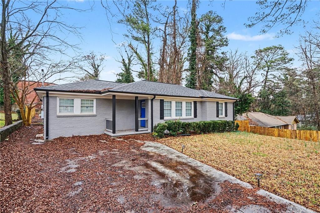 2912 Belvedere Lane Decatur, GA 30032 - Photo 2 of 25 a front view of a house with a yard