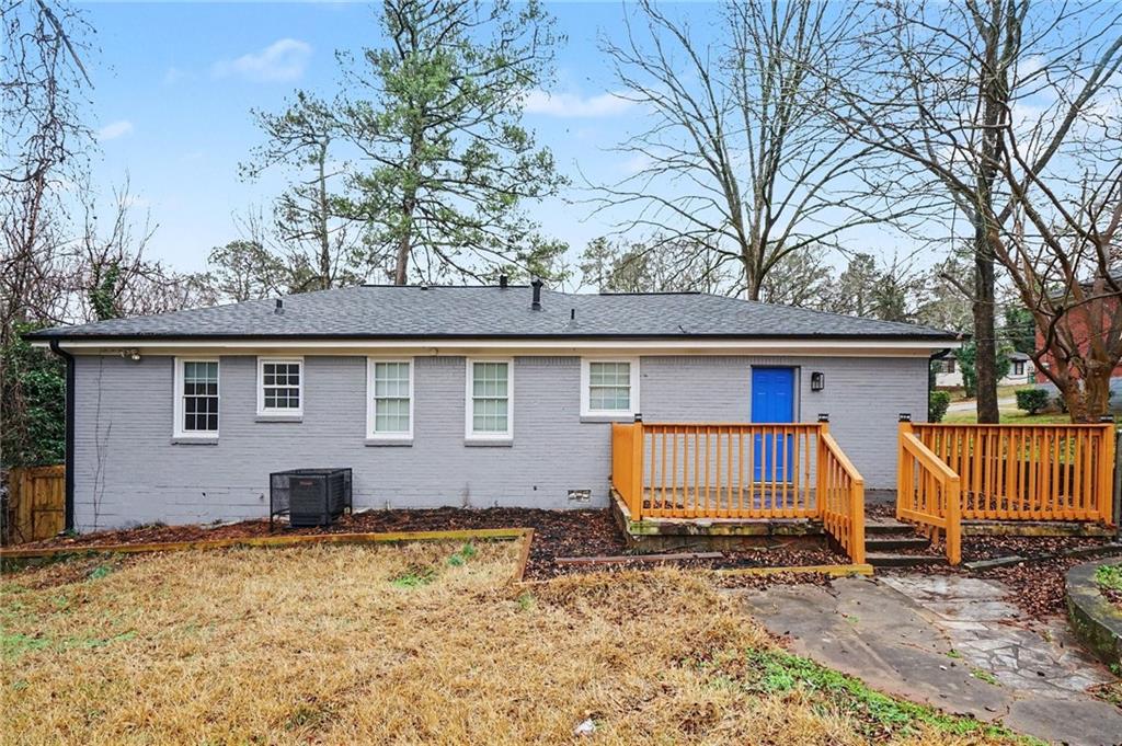 2912 Belvedere Lane Decatur, GA 30032 - Photo 23 of 25 a house that has a tree in front of it