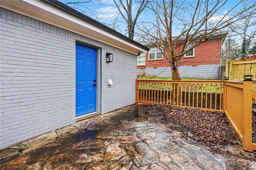 2912 Belvedere Lane Decatur, GA 30032 - Photo 24 of 25 a view of a wooden fence next to a road