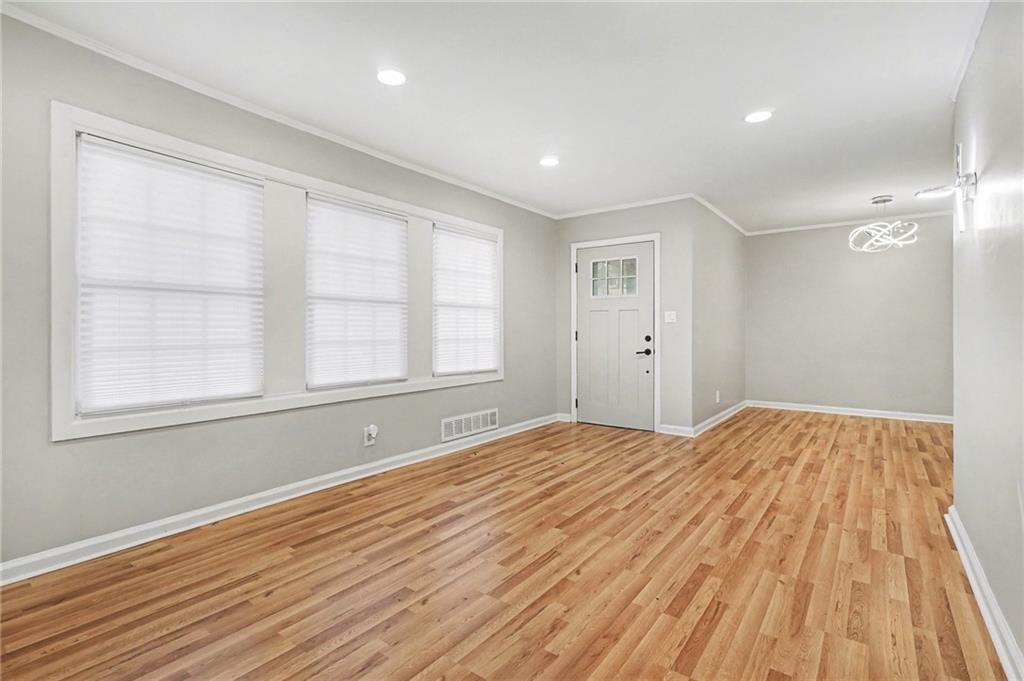 2912 Belvedere Lane Decatur, GA 30032 - Photo 3 of 25 a view of empty room with wooden floor and fan