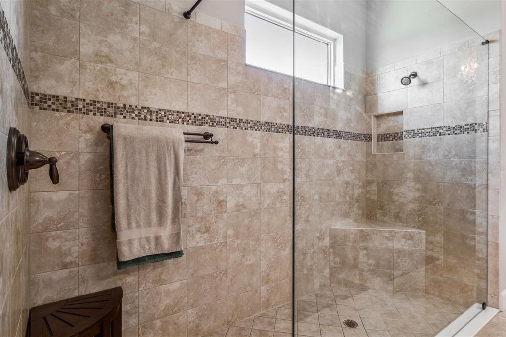 8530 Grand Alberato Road Tampa, FL 33647 - Photo 38 of 67 a bathroom with a shower