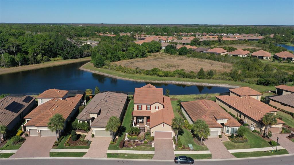 8530 Grand Alberato Road Tampa, FL 33647 - Photo 51 of 67 an aerial view of residential houses with outdoor space and river