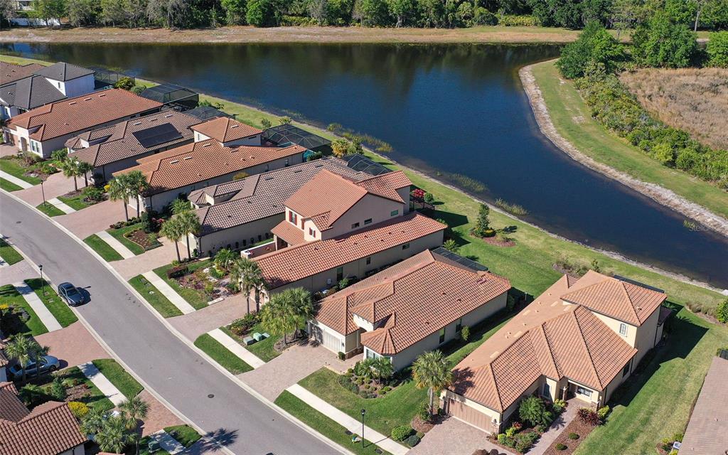 8530 Grand Alberato Road Tampa, FL 33647 - Photo 55 of 67 an aerial view of a house with a lake view
