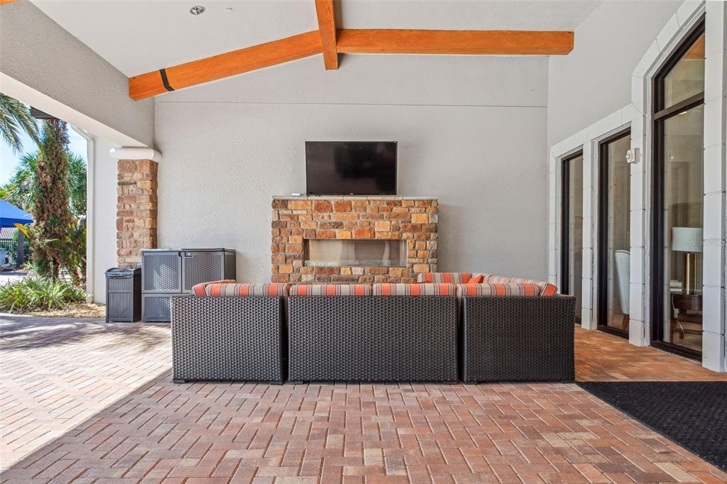 8530 Grand Alberato Road Tampa, FL 33647 - Photo 61 of 67 a living room with furniture and a flat screen tv