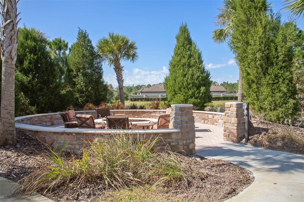 8530 Grand Alberato Road Tampa, FL 33647 - Photo 65 of 67 a view of a lake with a sitting area