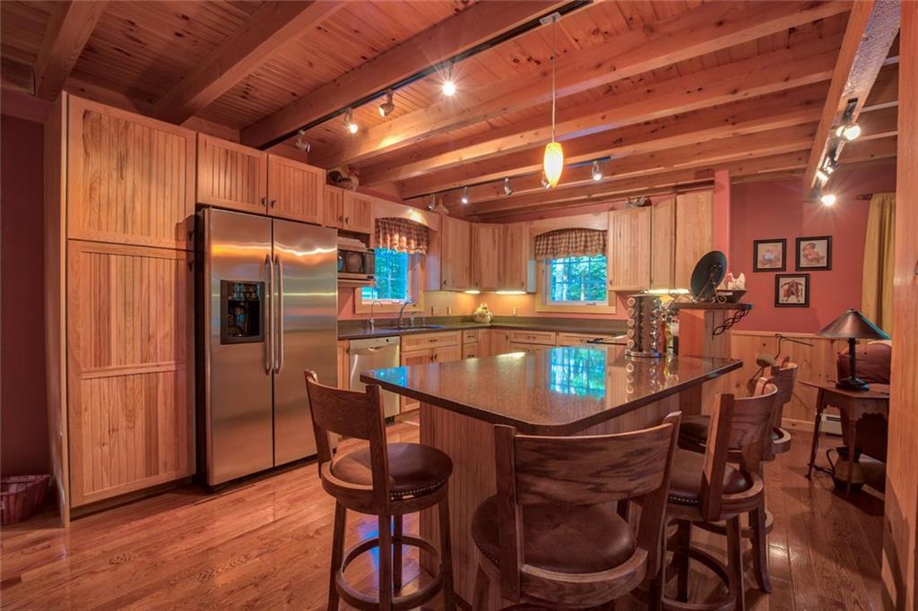 45 Lambs Mill Road Naples, ME 04055 - Photo 15 of 35 Kitchen island/eating area