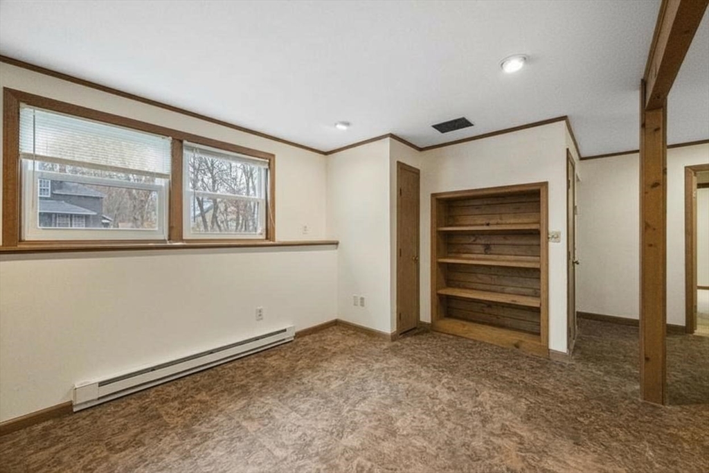 15 Cumberland Street Worcester, MA 01606 - Photo 21 of 35 a view of an empty room with a window