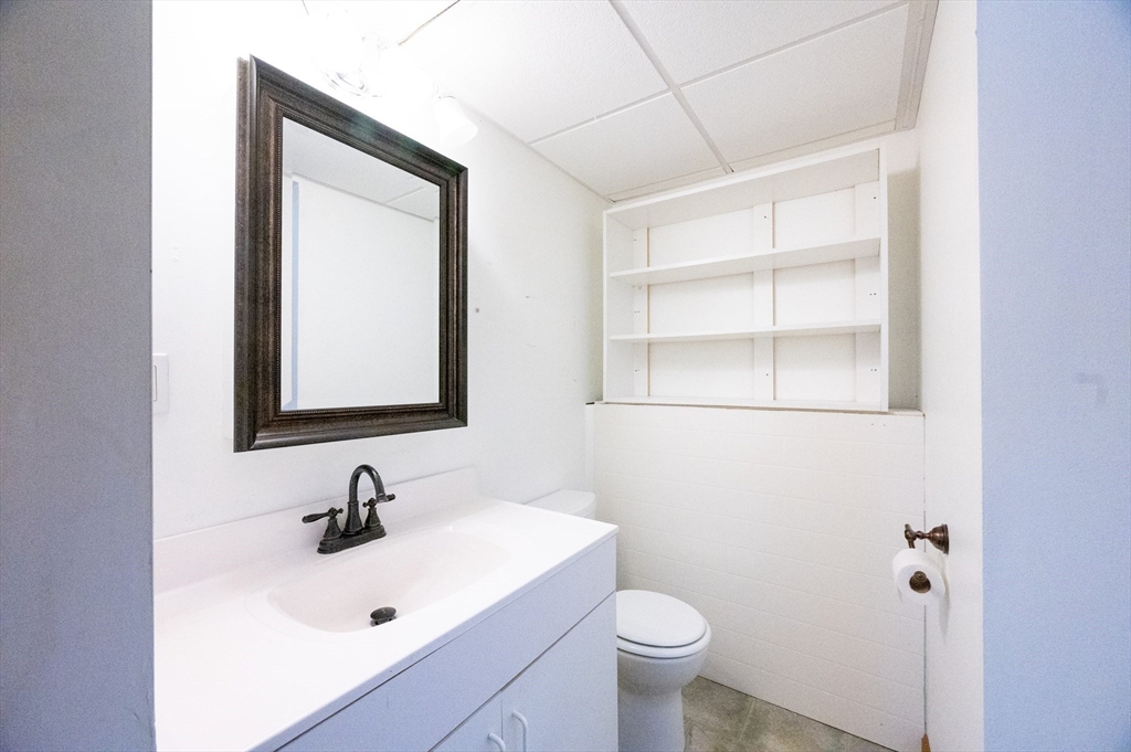 15 Cumberland Street Worcester, MA 01606 - Photo 22 of 35 a bathroom with a sink and a toilet