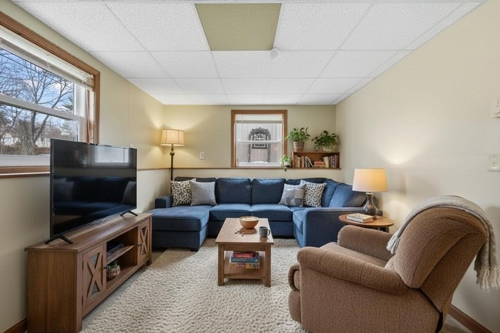 15 Cumberland Street Worcester, MA 01606 - Photo 26 of 35 a living room with furniture and a flat screen tv