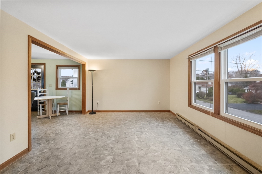 15 Cumberland Street Worcester, MA 01606 - Photo 5 of 35 a view of an empty room with a window