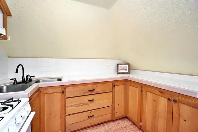 a kitchen with a sink and a cabinets