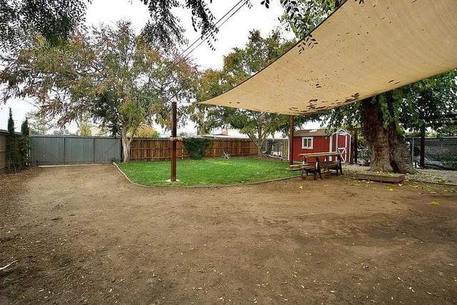 a view of a house with a street