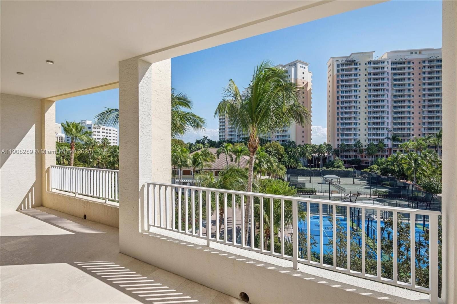717 Crandon Boulevard, Unit 507 Key Biscayne, FL 33149 - Photo 4 of 27 a balcony view with a garden space