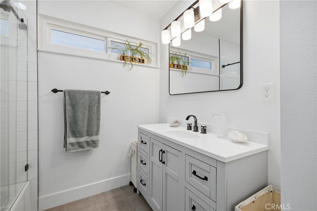 384 Colorado Street Arcadia, CA 91007 - Photo 46 of 51 a bathroom with a sink and a mirror
