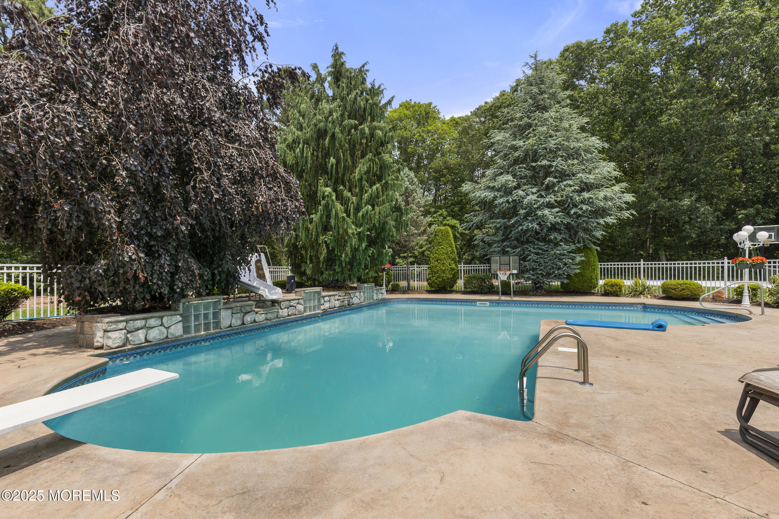 3 Wellesly Court Jackson, NJ 08527 - Photo 11 of 32 a view of a swimming pool with a yard