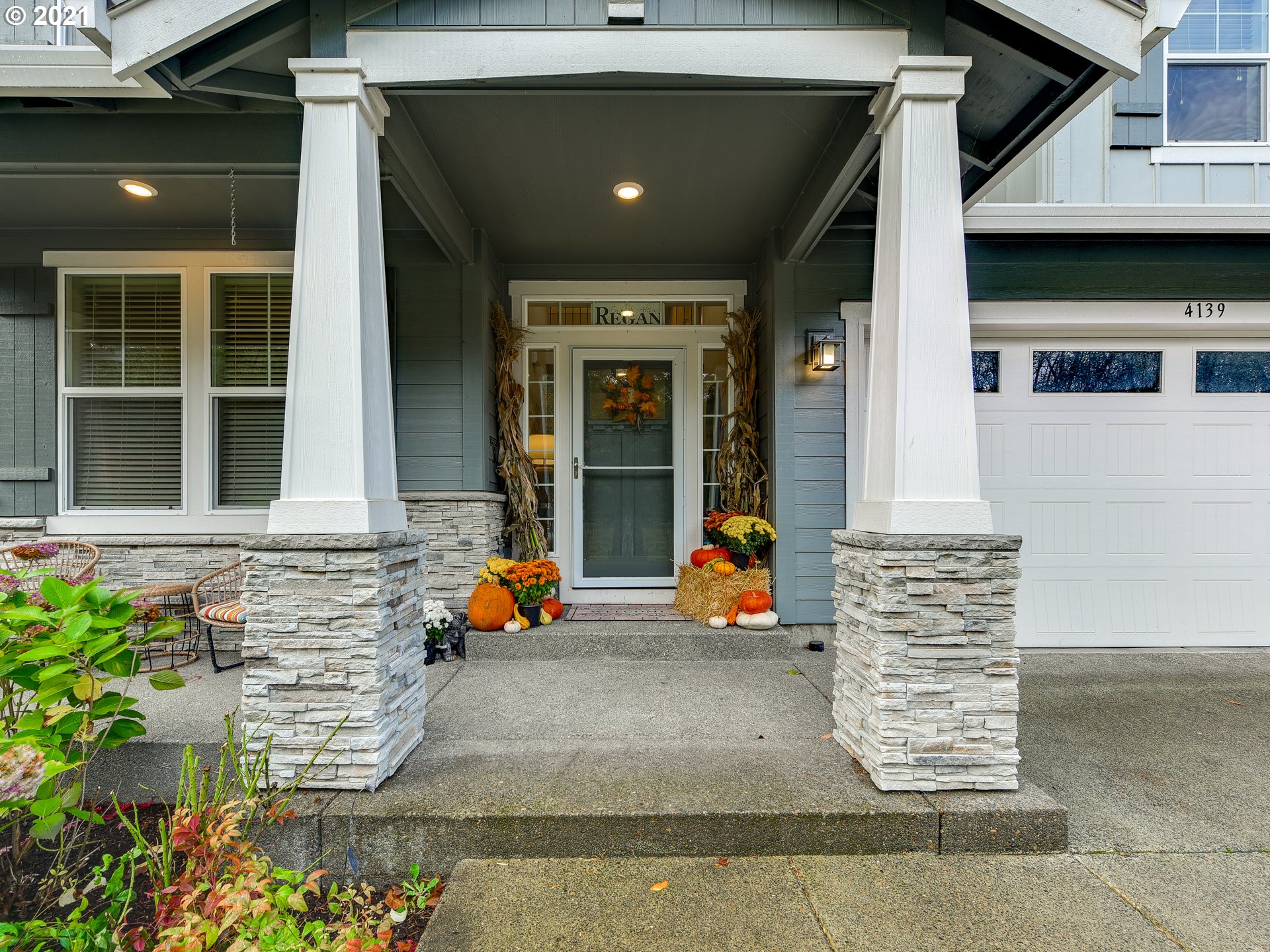 4139 Southwest Rodlun Road Gresham, OR 97080 - Photo 2 of 32 two couches and a potted plant sitting in front of a building