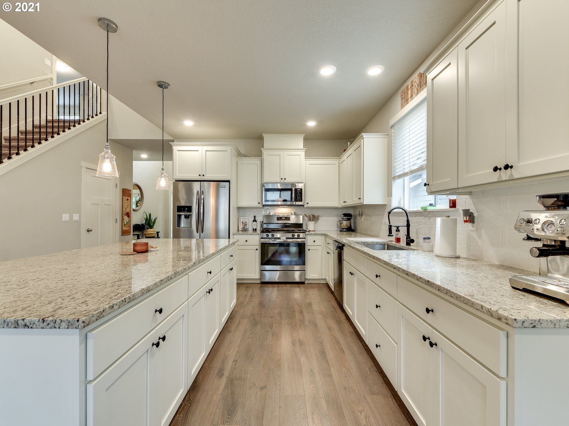 4139 Southwest Rodlun Road Gresham, OR 97080 - Photo 12 of 32 a large kitchen with granite countertop lots of counter space and window