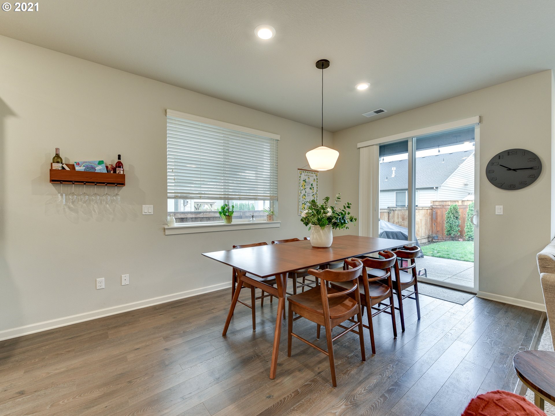 4139 Southwest Rodlun Road Gresham, OR 97080 - Photo 15 of 32 a view of a dining room with furniture window and wooden floor