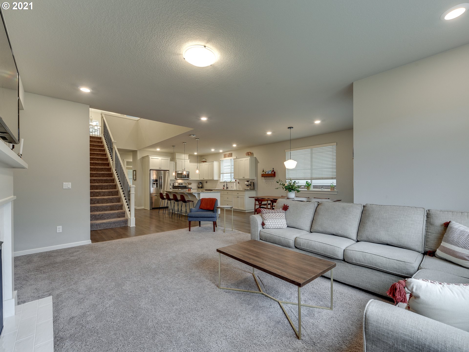 4139 Southwest Rodlun Road Gresham, OR 97080 - Photo 20 of 32 a living room with furniture and a ceiling fan