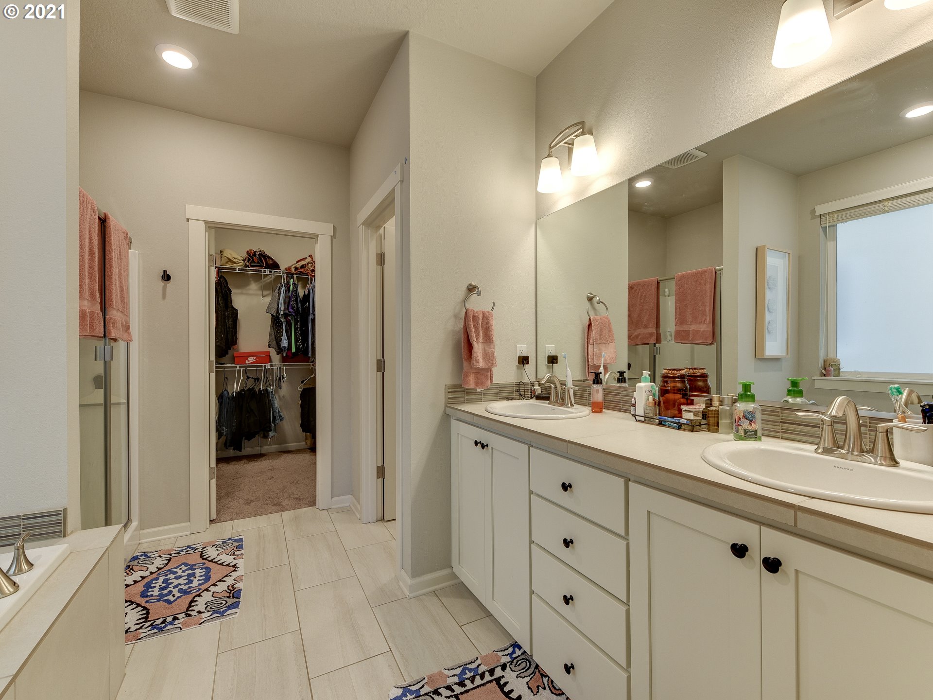 4139 Southwest Rodlun Road Gresham, OR 97080 - Photo 24 of 32 a spacious bathroom with a double vanity sink and a mirror