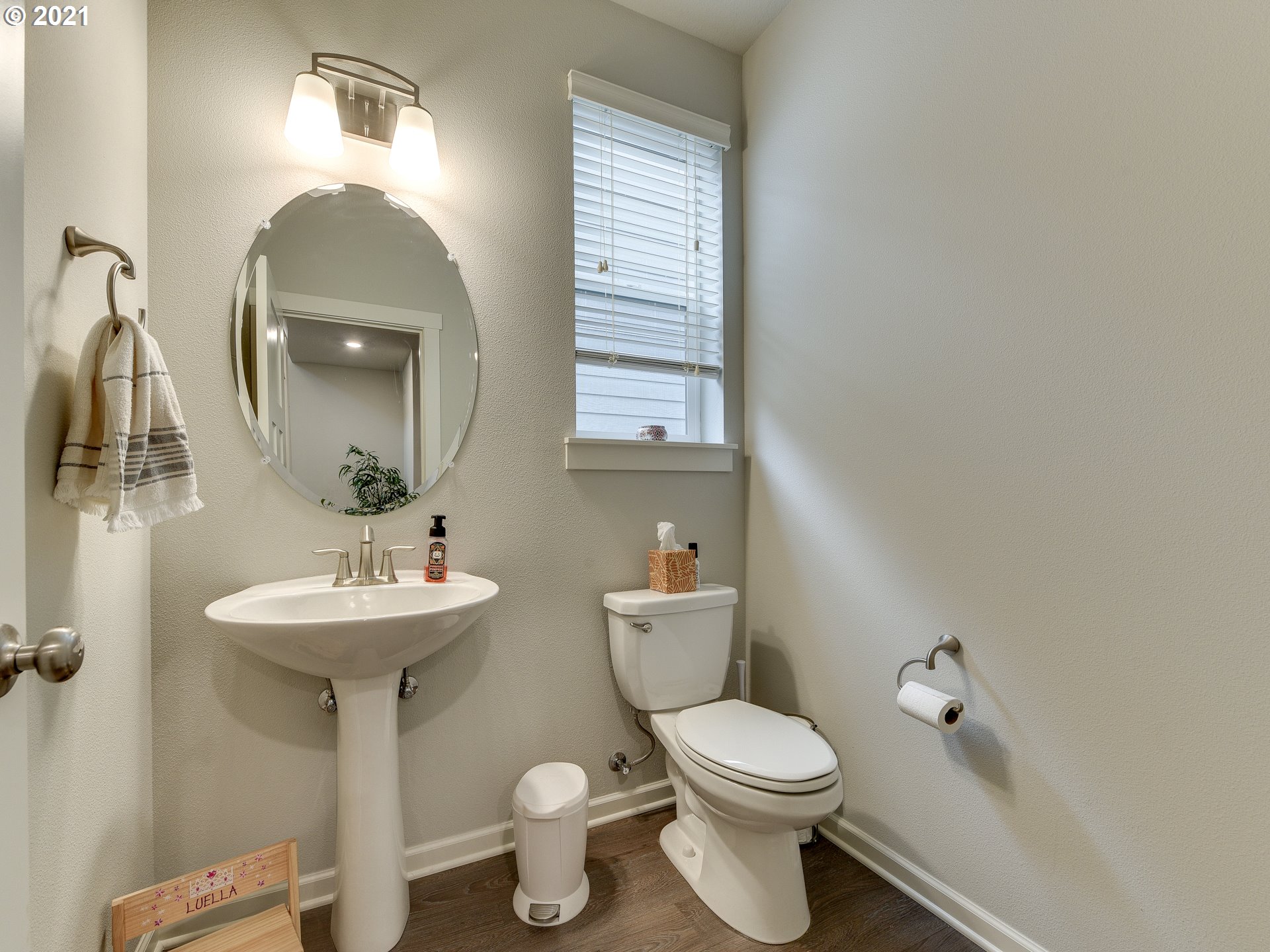 4139 Southwest Rodlun Road Gresham, OR 97080 - Photo 6 of 32 a bathroom with a toilet sink and mirror