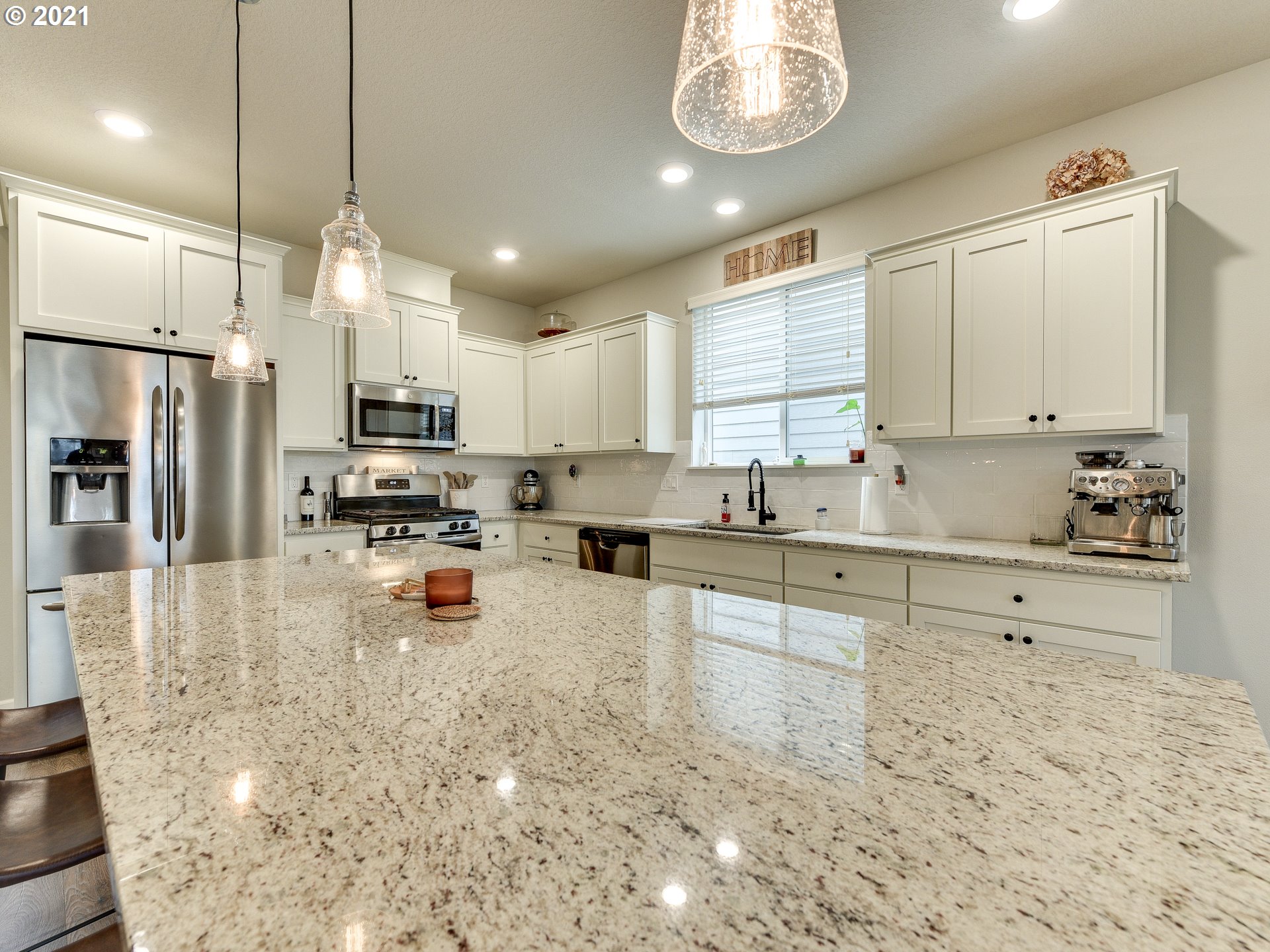 4139 Southwest Rodlun Road Gresham, OR 97080 - Photo 10 of 32 a kitchen with stainless steel appliances a refrigerator sink and microwave