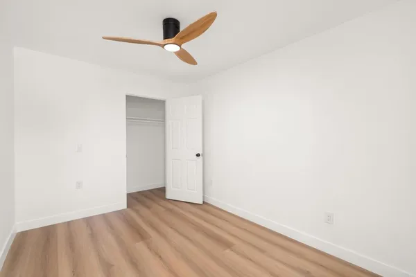 a view of small space with wooden floor