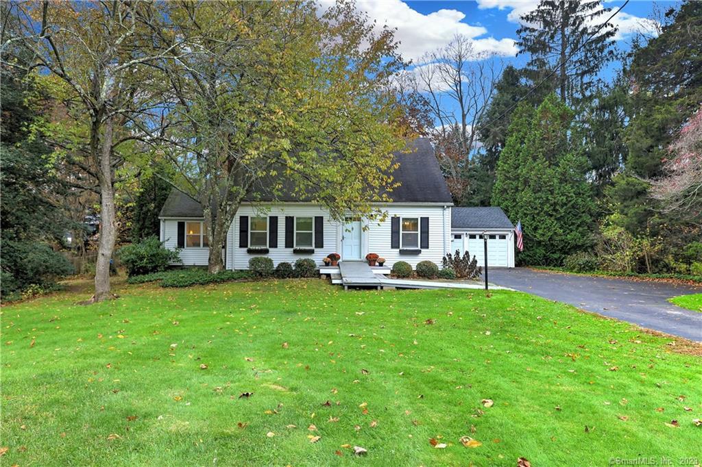 372 Lambert Road Orange, CT 06477 - Photo 1 of 1 a front view of a house with yard patio and green space