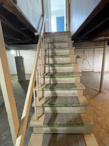 a view of entryway with a front door