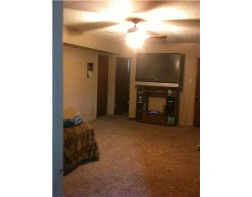 a view of a livingroom with a fireplace