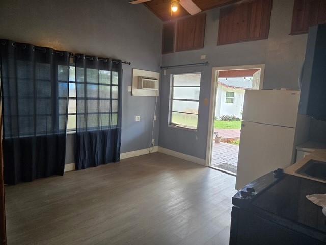 310 Northeast 2nd Street, Unit 4 Pompano Beach, FL 33060 - Photo 2 of 6 an empty room with windows