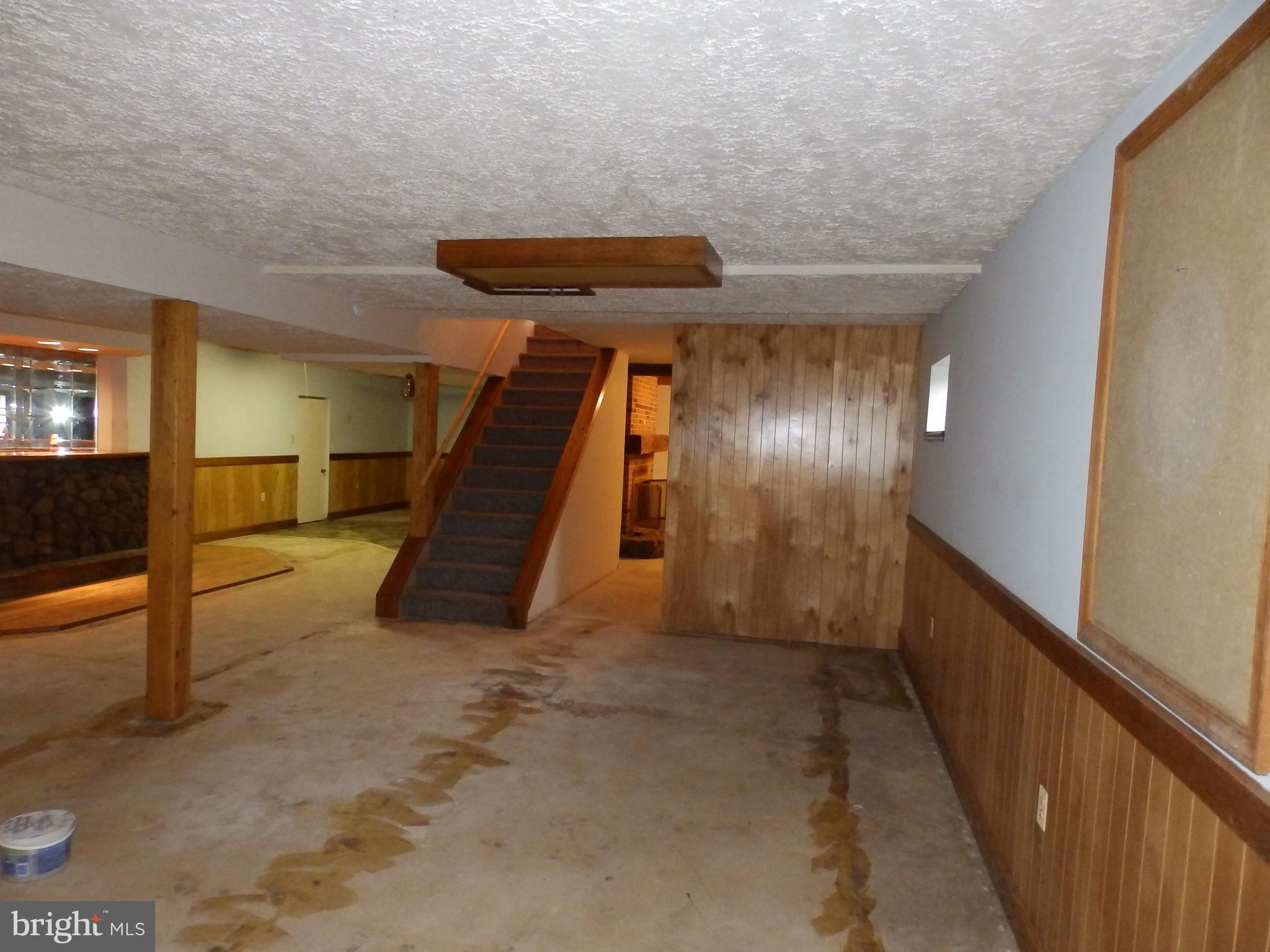 3395 Weldon Road New Windsor, MD 21776 - Photo 23 of 34 a view of an empty room with stairs