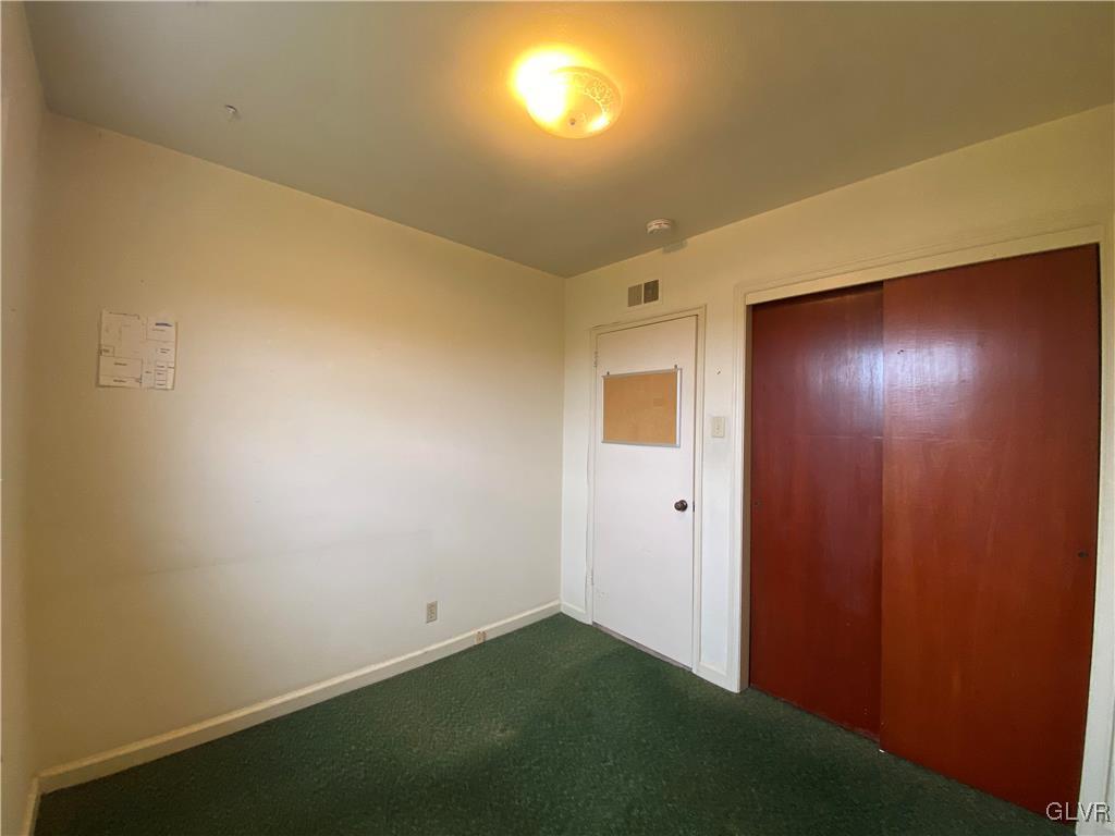 1516 Fairmount Street Bethlehem, PA 18017 - Photo 18 of 38 an empty room with windows