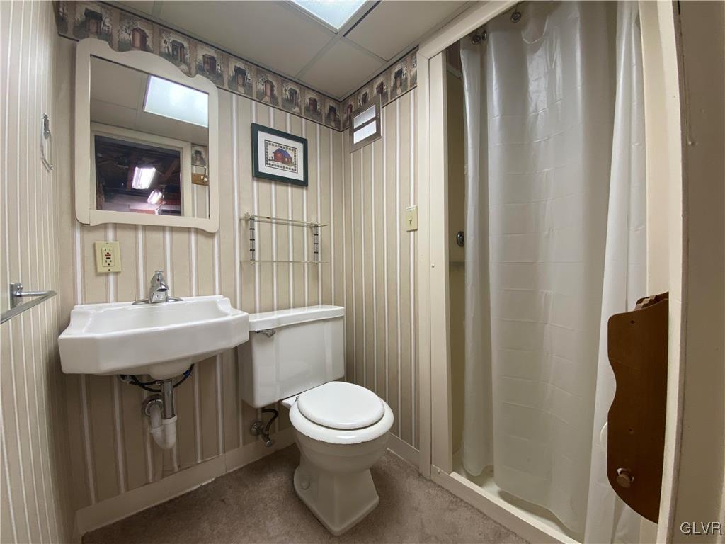 1516 Fairmount Street Bethlehem, PA 18017 - Photo 28 of 38 a bathroom with a toilet a sink and mirror