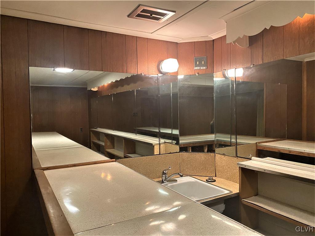 1516 Fairmount Street Bethlehem, PA 18017 - Photo 34 of 38 a bathroom with a mirror and a shower