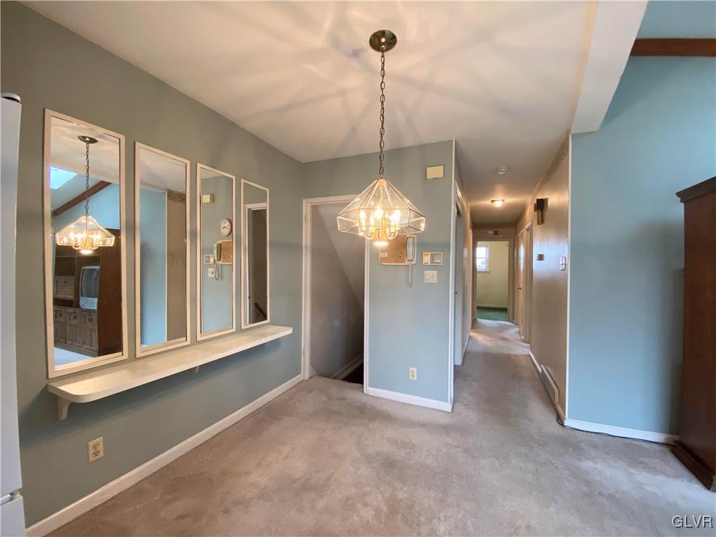 1516 Fairmount Street Bethlehem, PA 18017 - Photo 4 of 38 a view of a room with a chandelier fan and windows