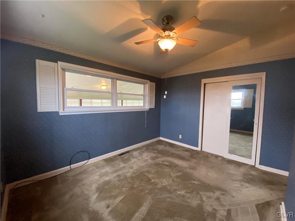 1516 Fairmount Street Bethlehem, PA 18017 - Photo 5 of 38 an empty room with windows and fan